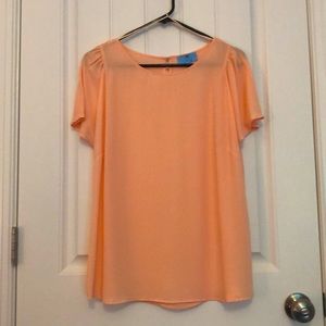 Ladies peach blouse, sheer fabric